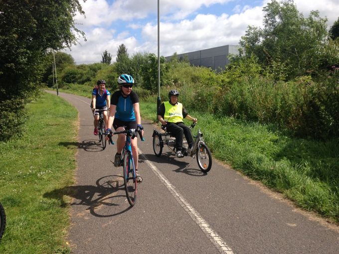 Regular adaptive Bike Rider Keith, with Donna and Amey.   Keith, a stroke recovery exemplar, recently did 130 laps of the athletics track on this bike raise money to send Donna on a post stroke care course.  