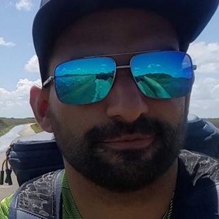 Profile photo for Parminder Dhillon