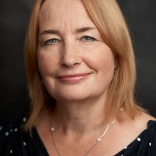 Profile photo for Carol Caine
