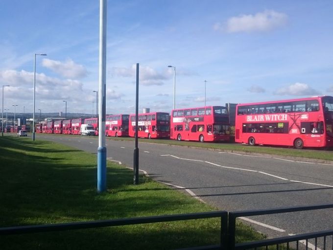 38 buses all transporting luggage to the finish line of the GNR. Sadly no participants wanted to be in the photo.