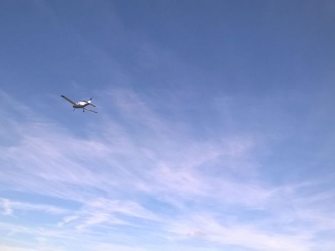 Plane taking off overhead