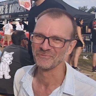 Profile photo for Neill Hughes